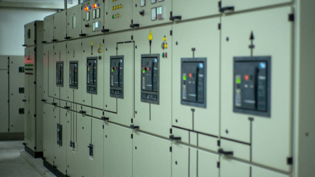 Industrial electrical control panels for backup power system and redundancy planning in a refrigerated warehouse facility.